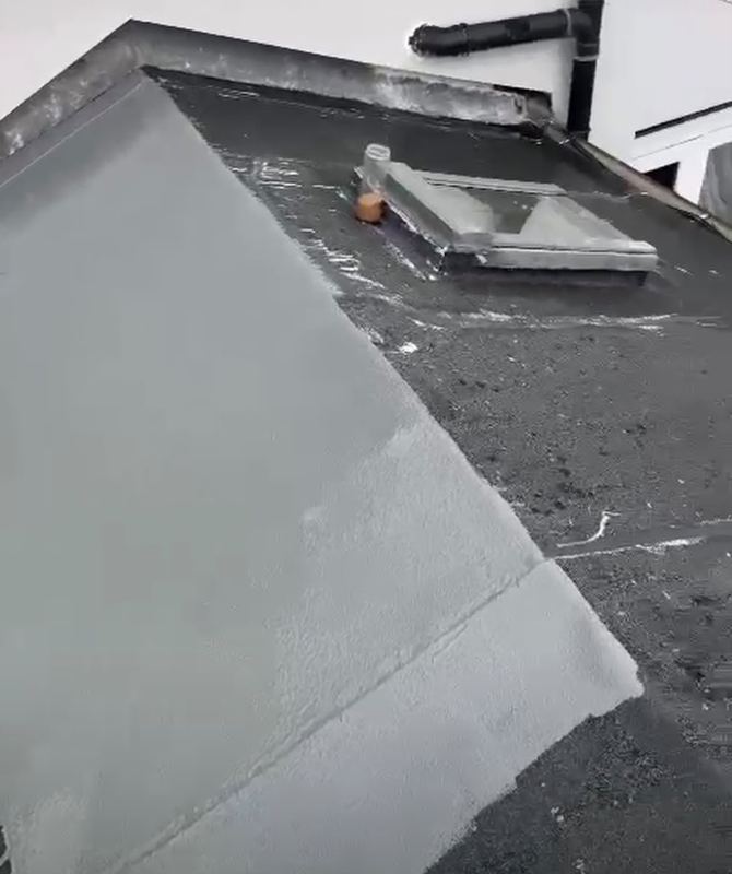 Finished grey flat roof with skylight